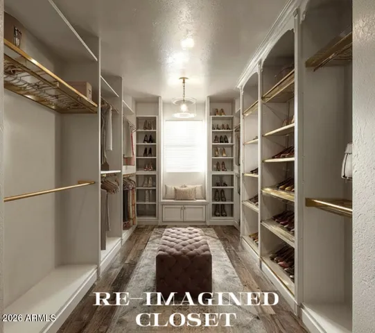 a bedroom with a bed and a table