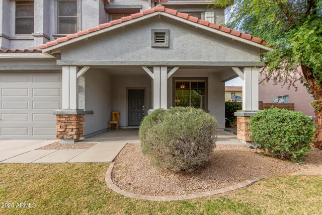 an empty room with closet area