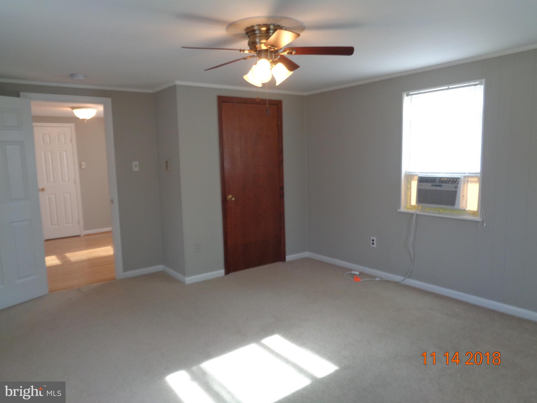 6335 Broomes Island Road St. Leonard, MD 20685 - Photo 12 of 32 Master bedroom