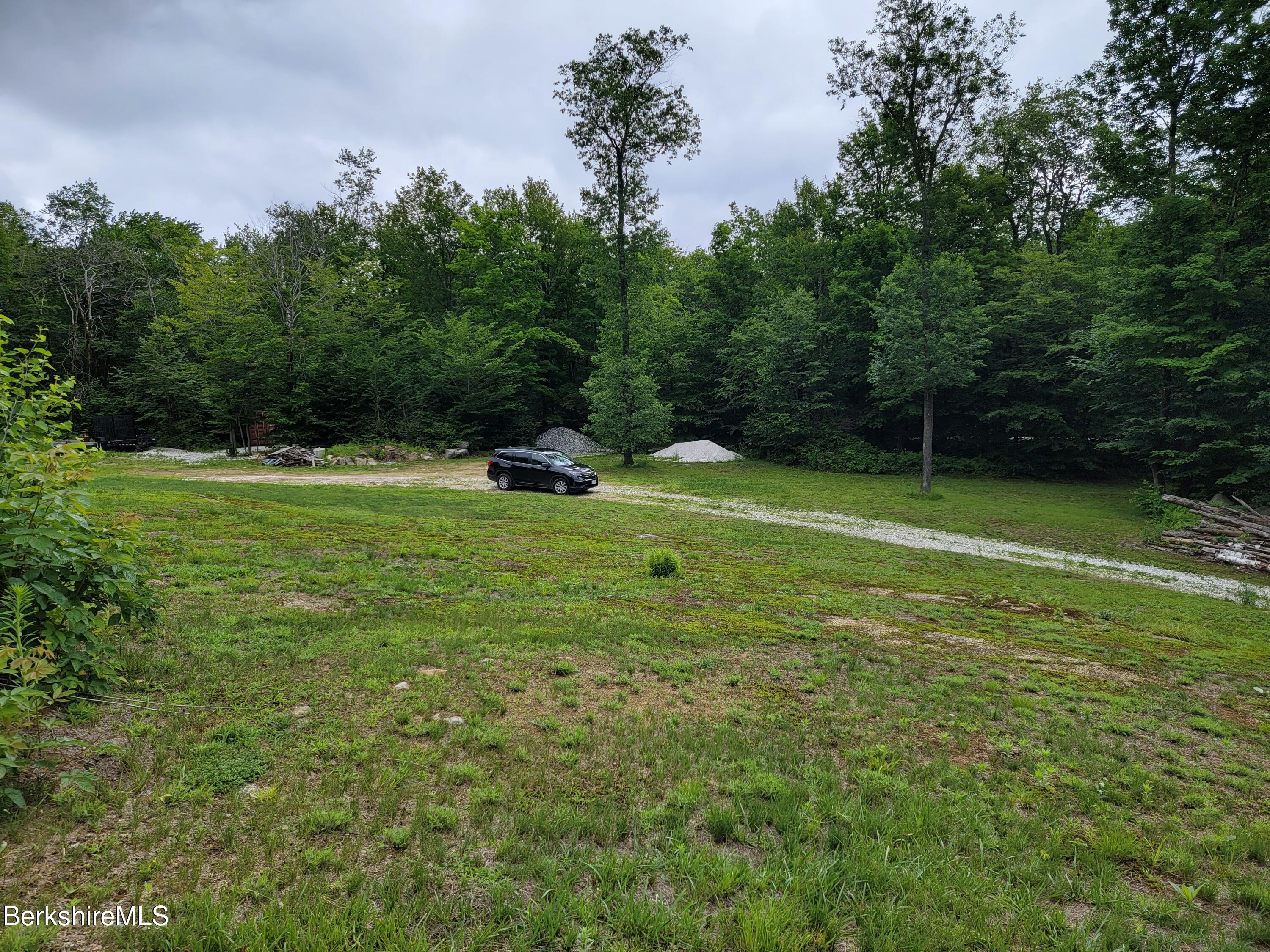Lot #6 Risky Ranch Road Stamford, VT 05352 - Photo 3 of 14 a view of field with grass and trees in the background