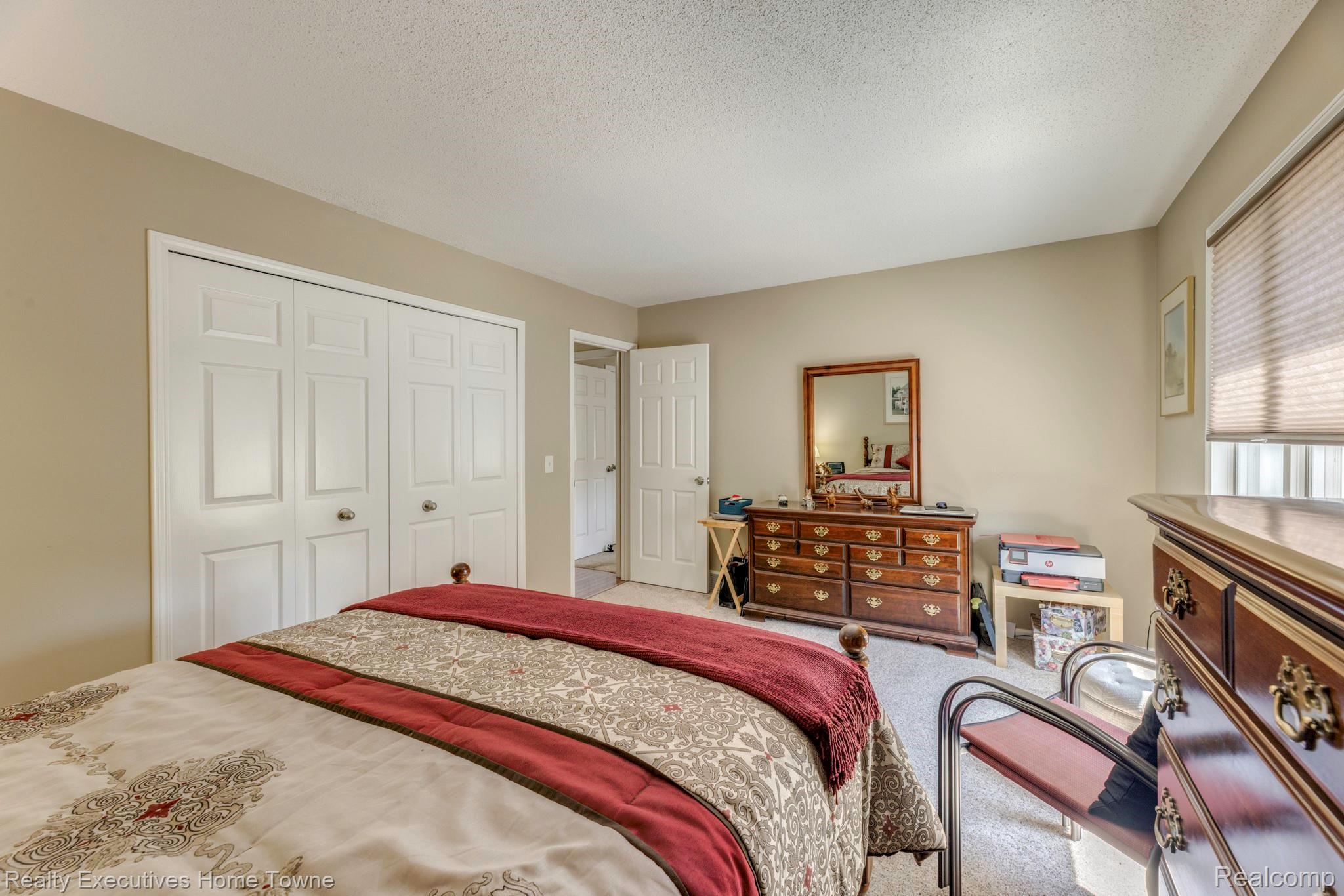 1467 Krafft Road, Unit 8 Port Huron, MI 48060 - Photo 21 of 30 Neutral wall color with a textured ceiling