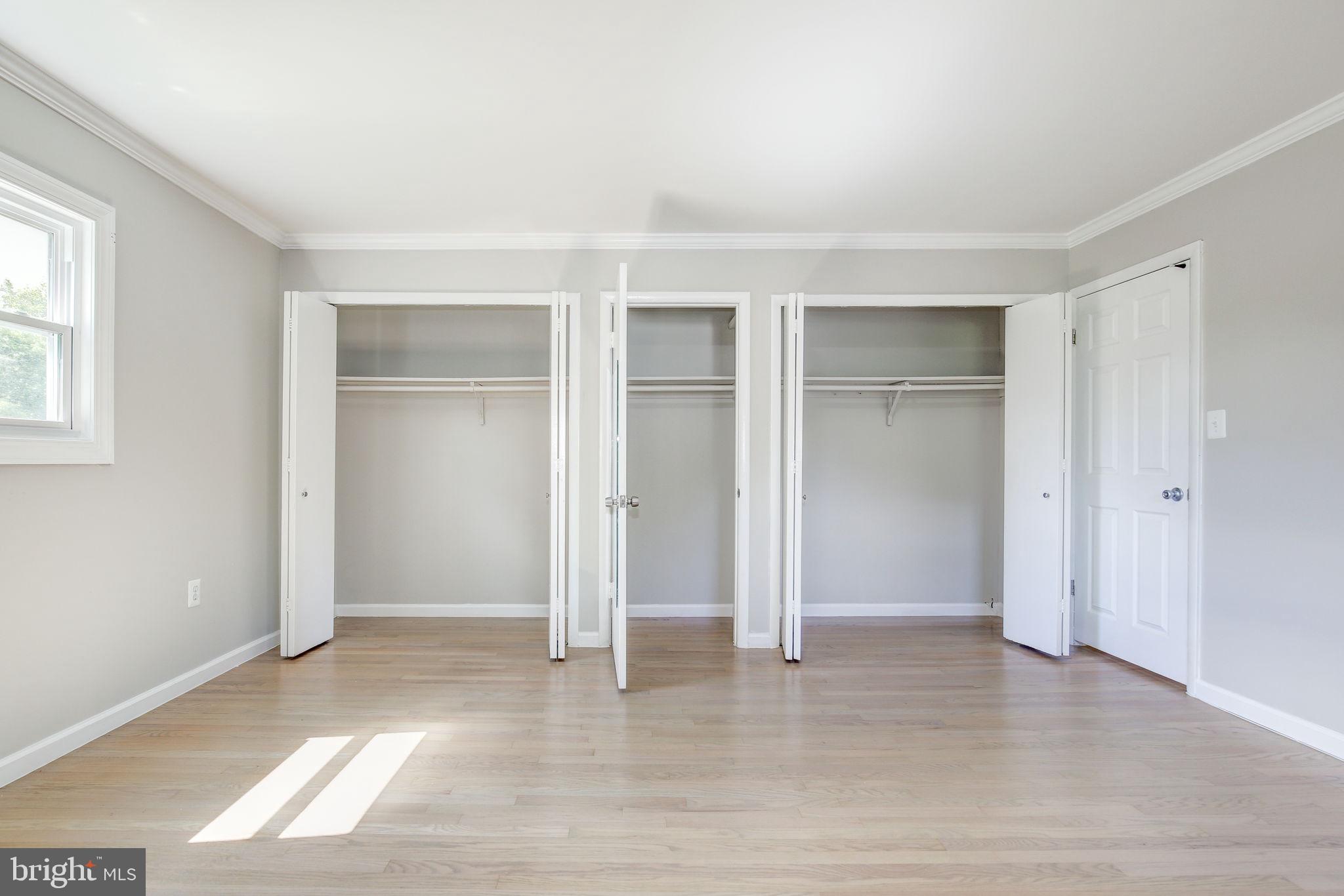 11830 Charles Road Silver Spring, MD 20906 - Photo 11 of 54 an empty room with window and closet