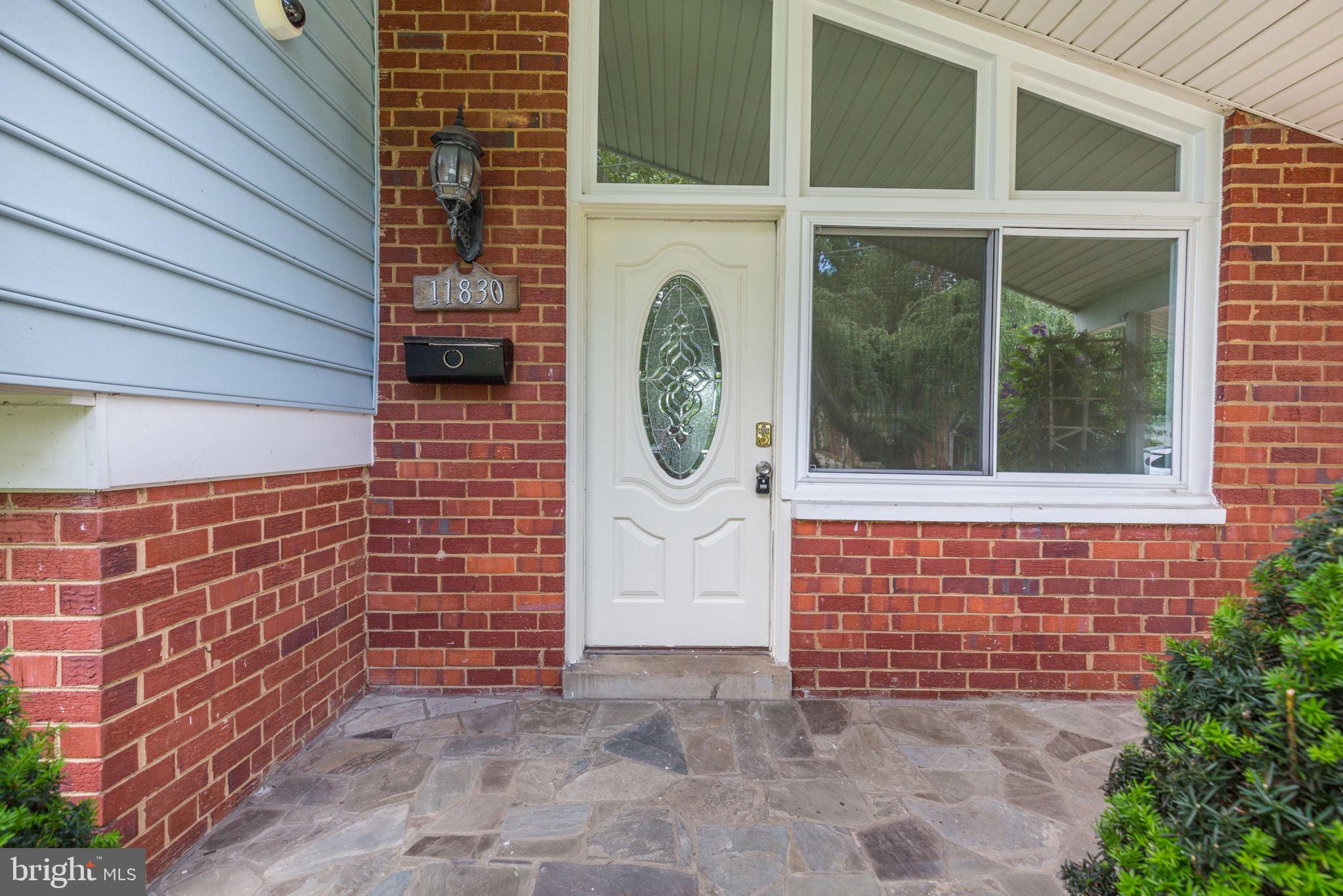 11830 Charles Road Silver Spring, MD 20906 - Photo 2 of 54 a view of entrance
