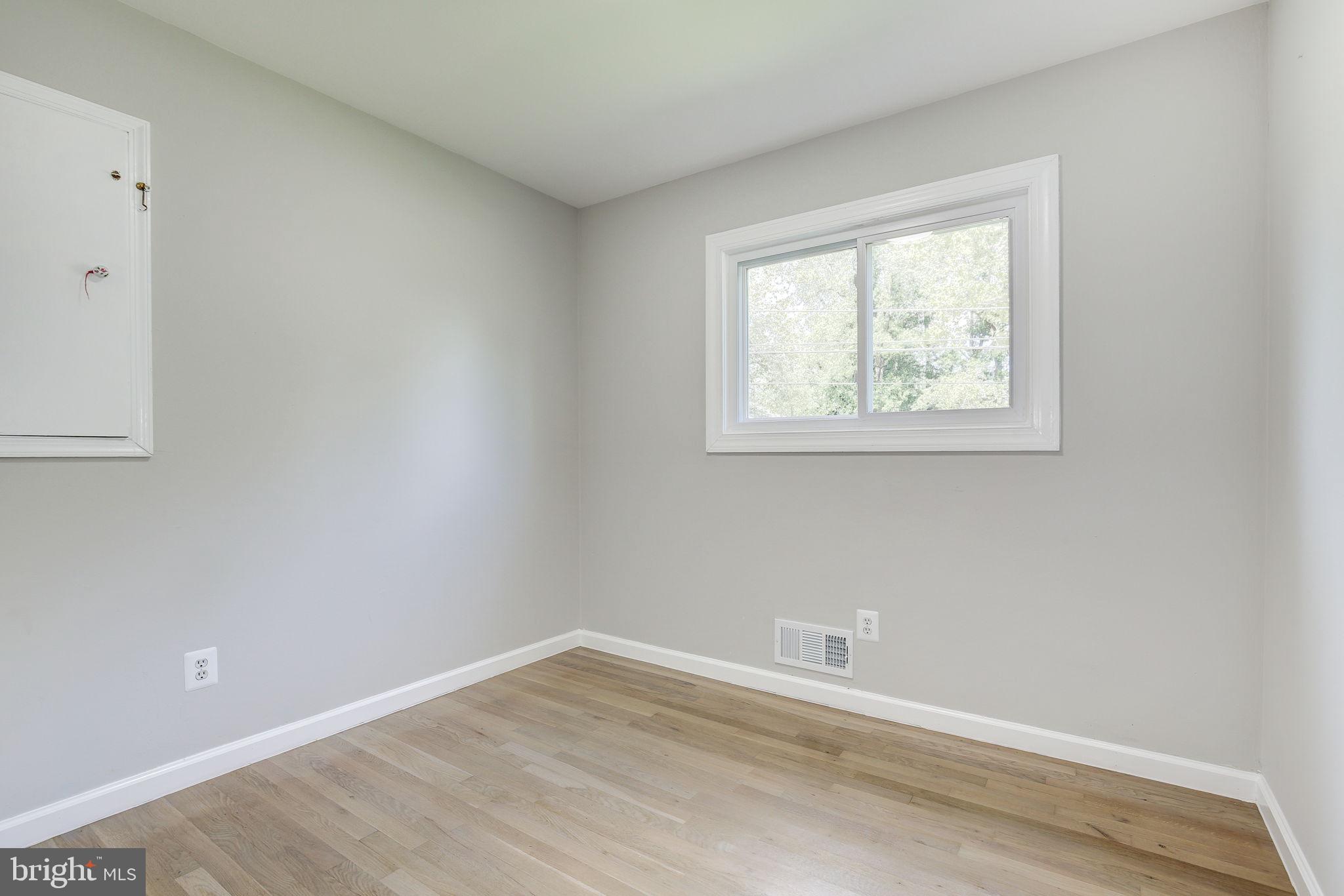 11830 Charles Road Silver Spring, MD 20906 - Photo 23 of 54 an empty room with a window