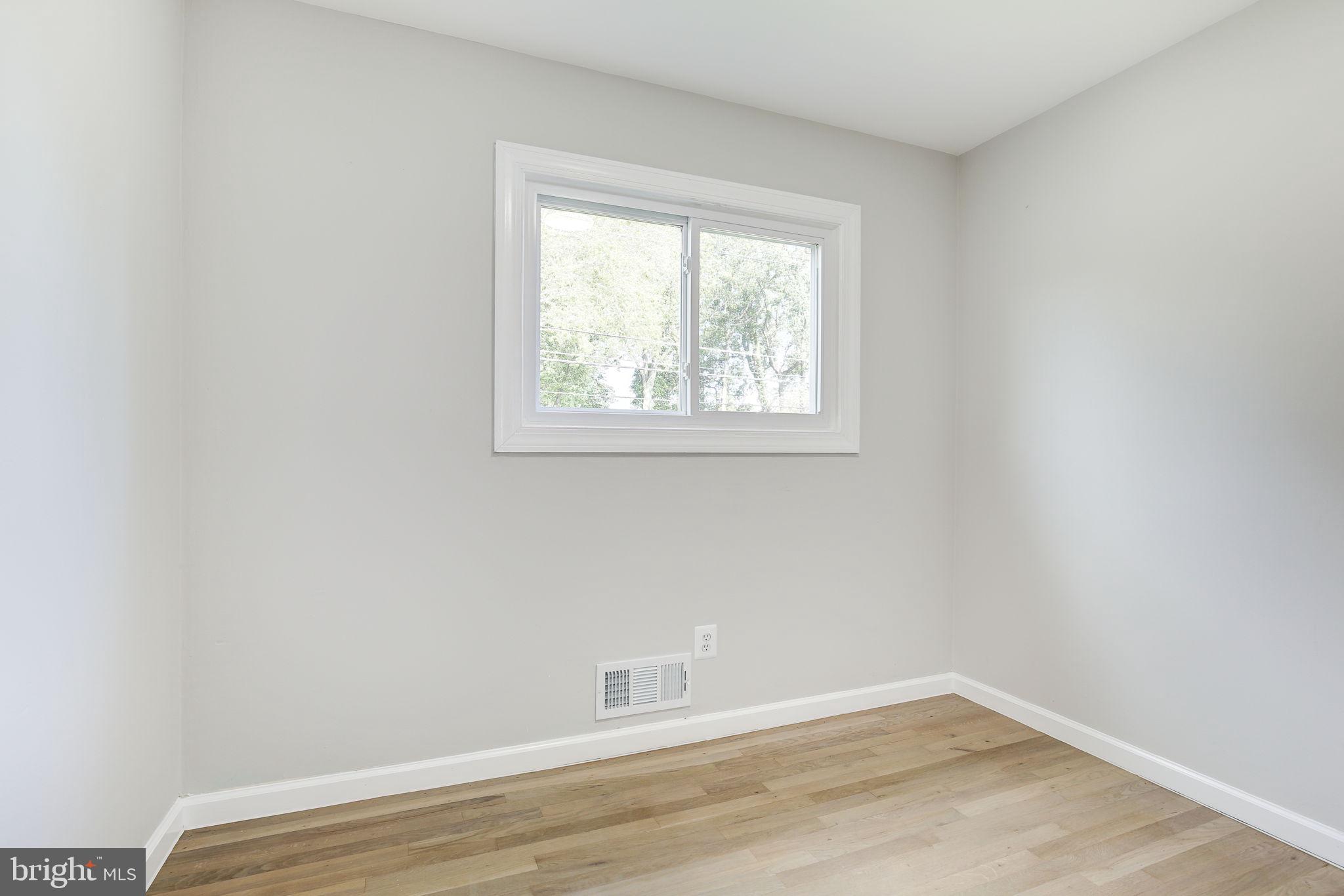 11830 Charles Road Silver Spring, MD 20906 - Photo 25 of 54 an empty room with a window