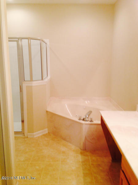 1816 Cross Pines Drive Fleming Island, FL 32003 - Photo 12 of 13 a view of staircase with wooden floor