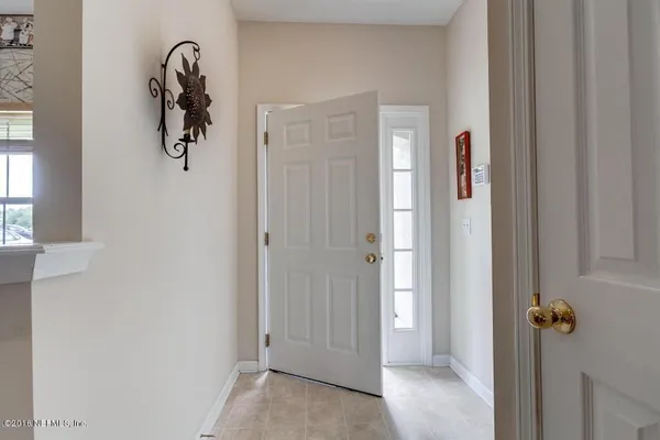 a view of a room with walk in closet and window