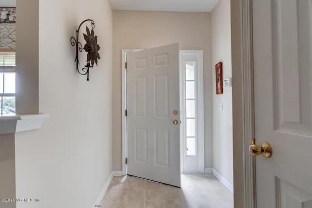 a view of a room with walk in closet and window