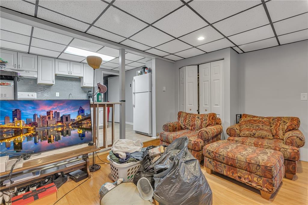 565 East Madison Street Rochester, PA 15074 - Photo 5 of 13 a living room with furniture and a couch