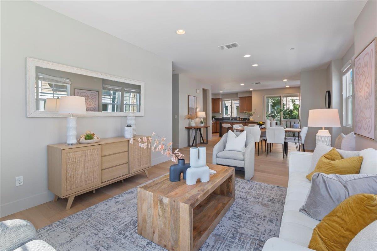 850 Sycamore Loop Mountain View, CA 94043 - Photo 11 of 36 a living room with furniture and a table