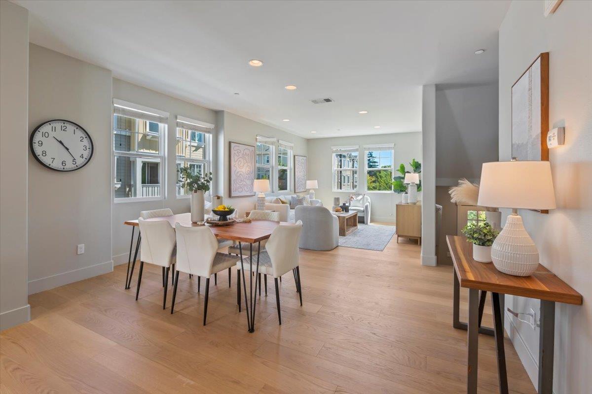850 Sycamore Loop Mountain View, CA 94043 - Photo 13 of 36 a view of a dining room with furniture window and wooden floor