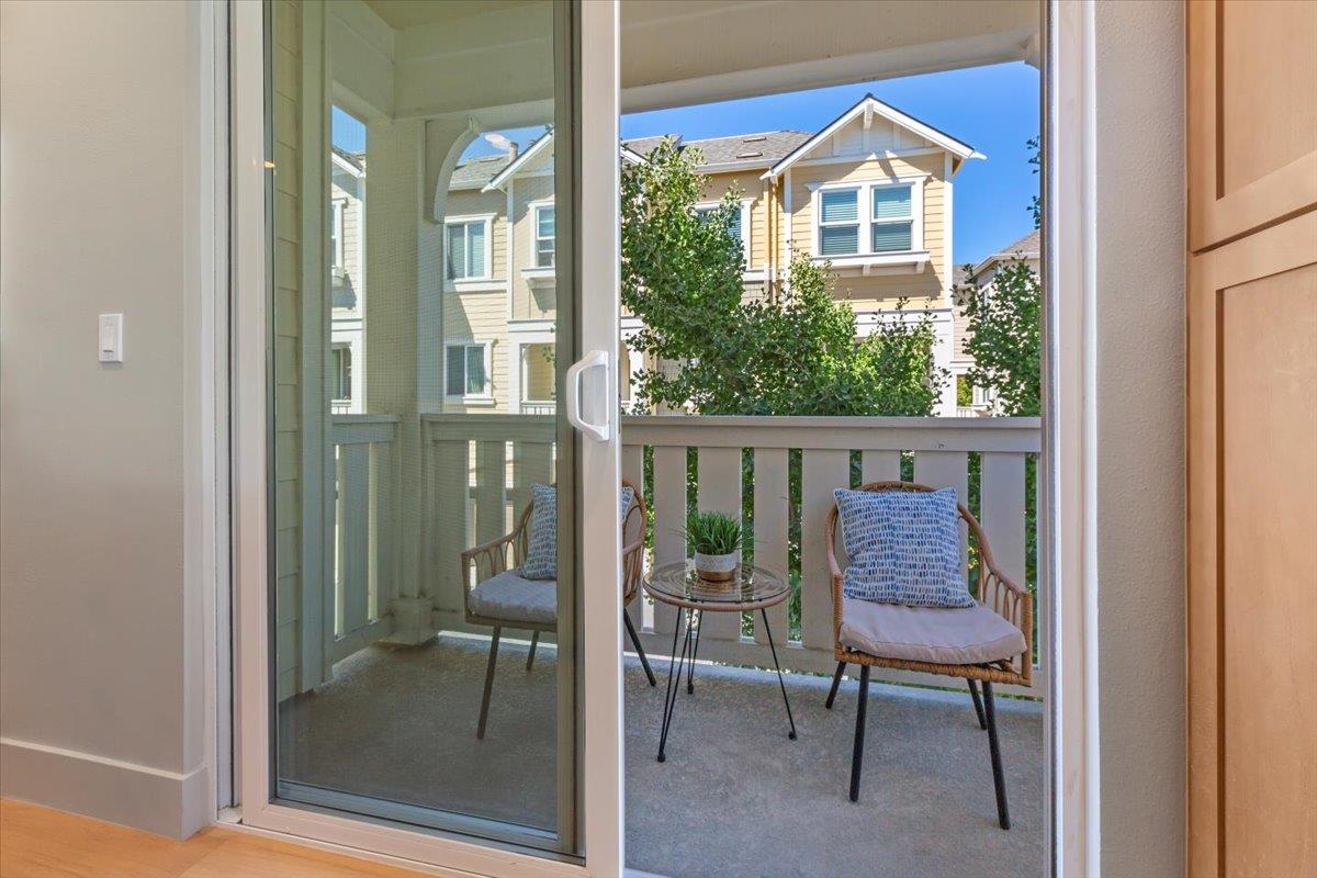 850 Sycamore Loop Mountain View, CA 94043 - Photo 19 of 36 a view of front door of a house with a chairs and table