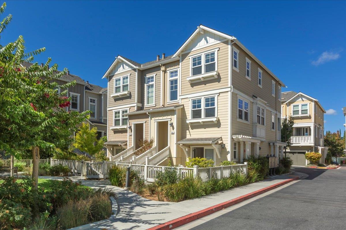 850 Sycamore Loop Mountain View, CA 94043 - Photo 2 of 36 a front view of a residential apartment building with a yard