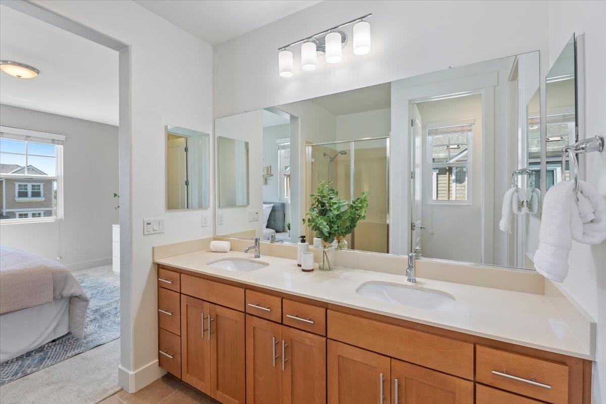 850 Sycamore Loop Mountain View, CA 94043 - Photo 27 of 36 a bathroom with double vanity sinks and a mirror