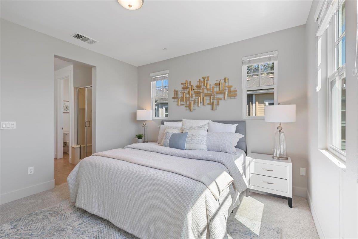 850 Sycamore Loop Mountain View, CA 94043 - Photo 29 of 36 a large white bed in a white room