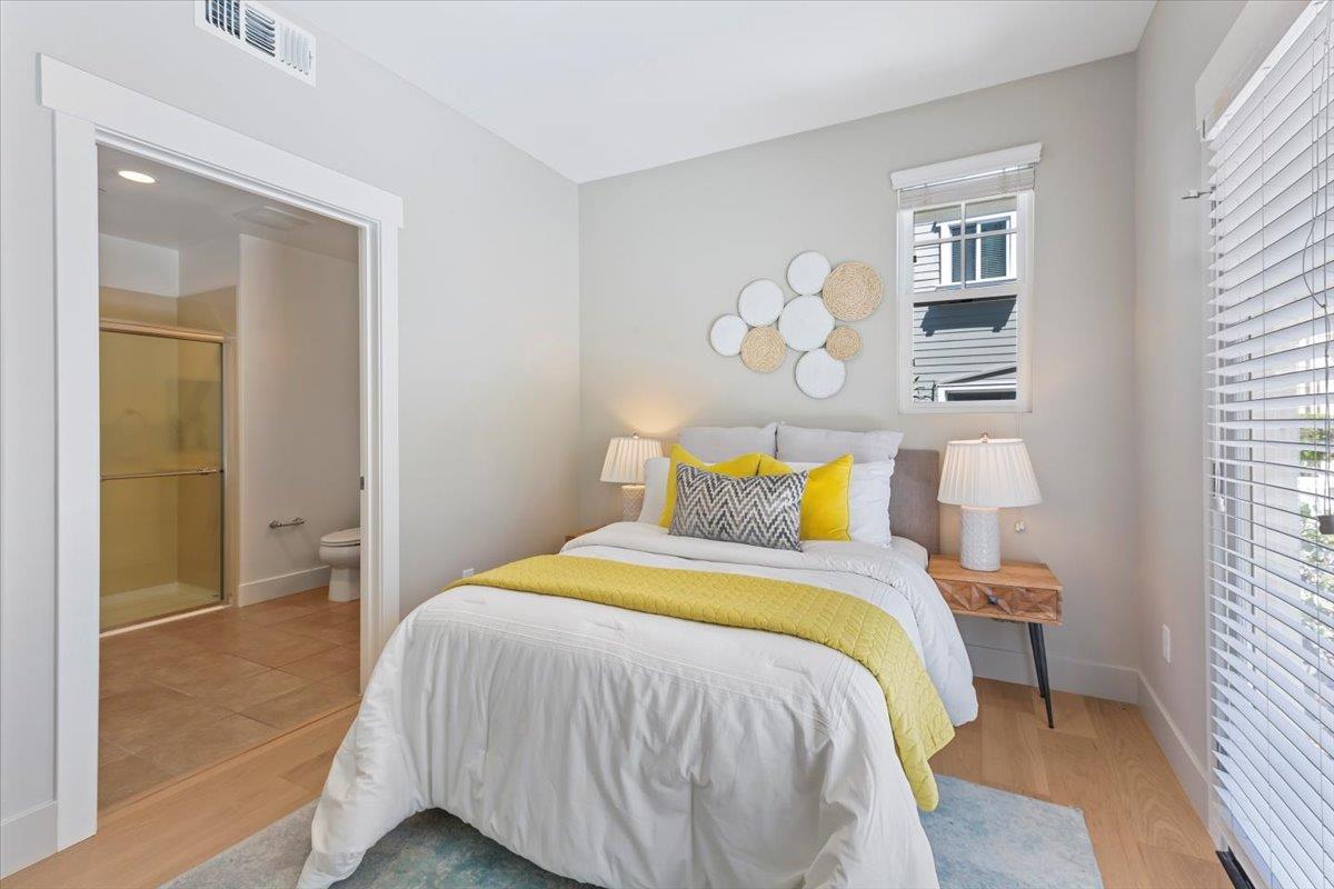 850 Sycamore Loop Mountain View, CA 94043 - Photo 35 of 36 a bedroom with a bed and a window
