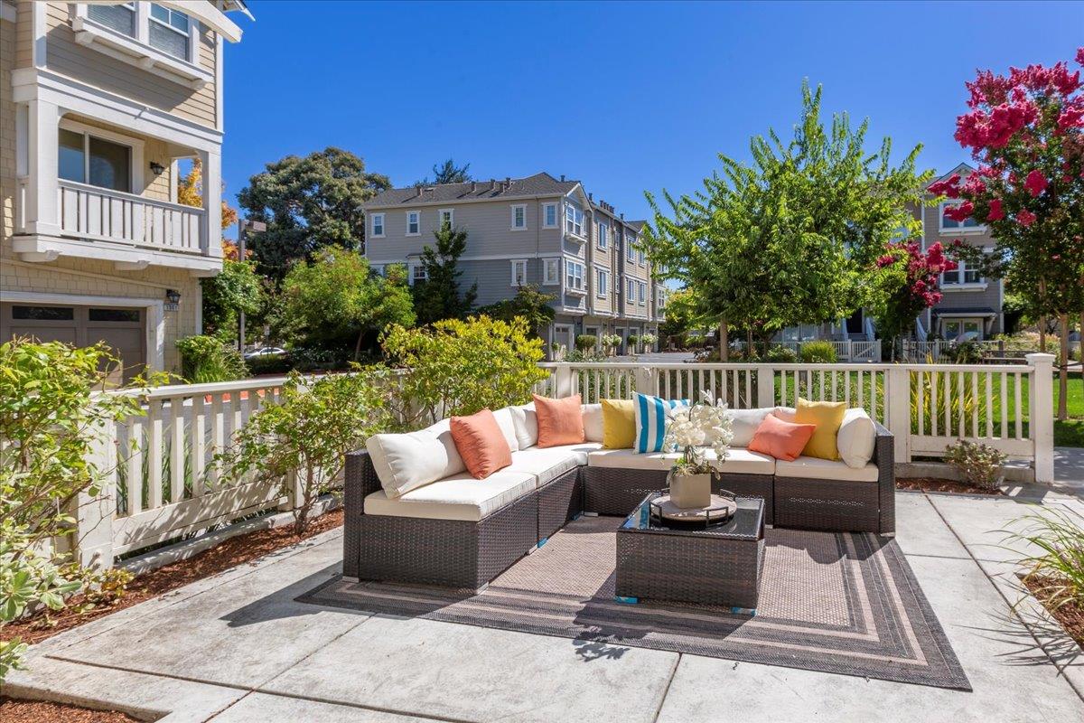 850 Sycamore Loop Mountain View, CA 94043 - Photo 5 of 36 a view of a patio with couches table and chairs and potted plants