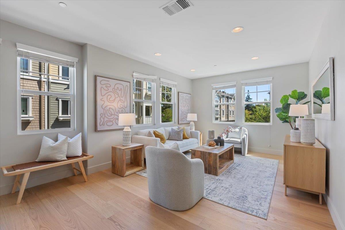 850 Sycamore Loop Mountain View, CA 94043 - Photo 8 of 36 a living room with furniture and wooden floor
