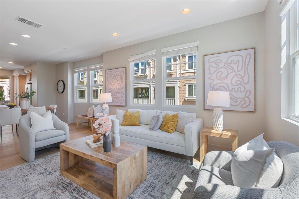 850 Sycamore Loop Mountain View, CA 94043 - Photo 10 of 36 a living room with furniture and a large window