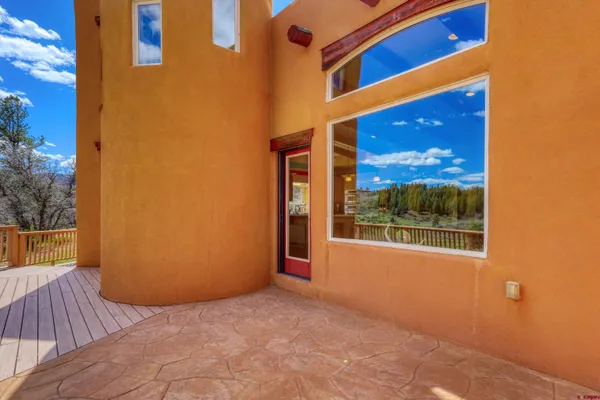 a view of a house with porch and wooden floor