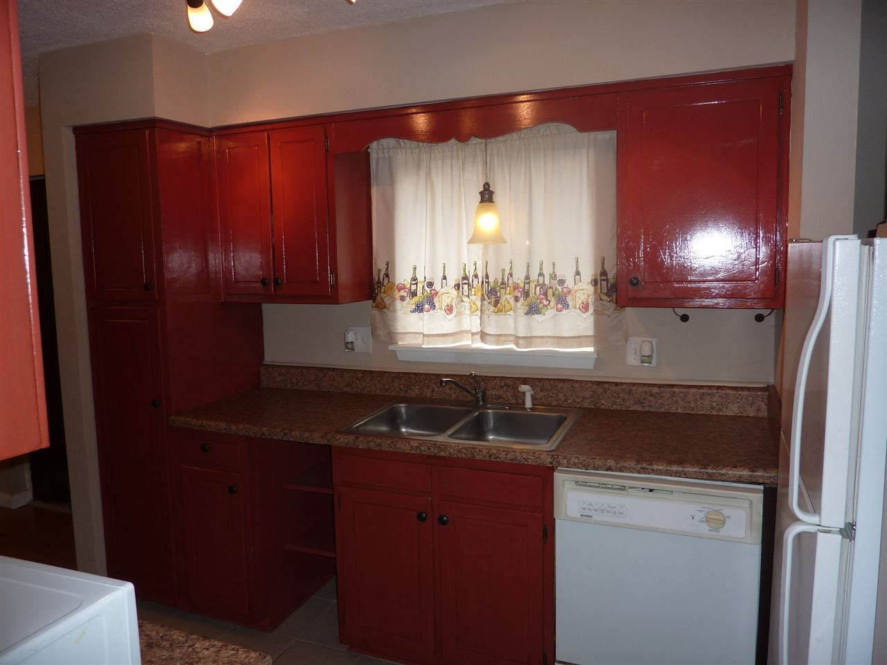 683 Pine Ridge Place, Unit 683 Raleigh, NC 27609 - Photo 6 of 12 With natural light, appliances & cabinet space, this kitchen is well kept and ready for you! Kitchen