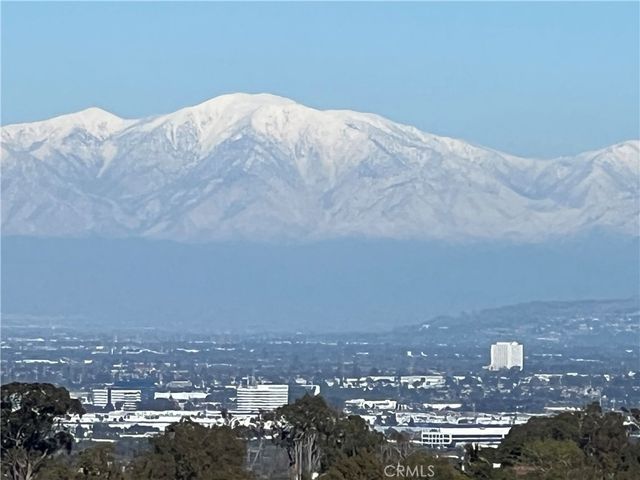 a view of a porch with a table and chairs