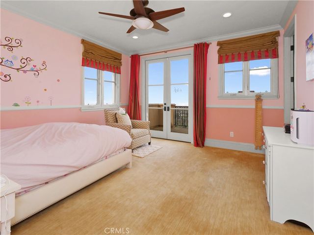 a bathroom with a granite countertop sink mirror vanity and toilet
