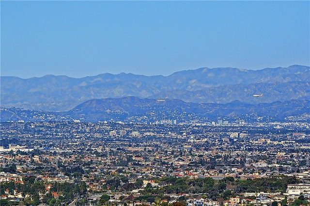 a view of city and mountain