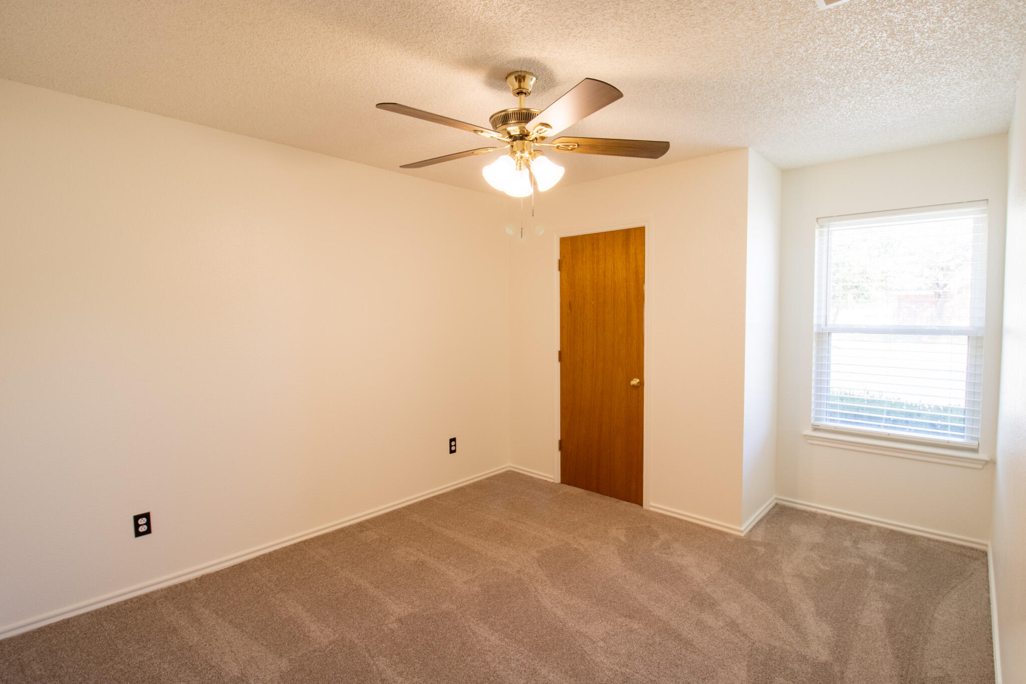 5731 95th Street Lubbock, TX 79424 - Photo 14 of 30 a view of a window in a room
