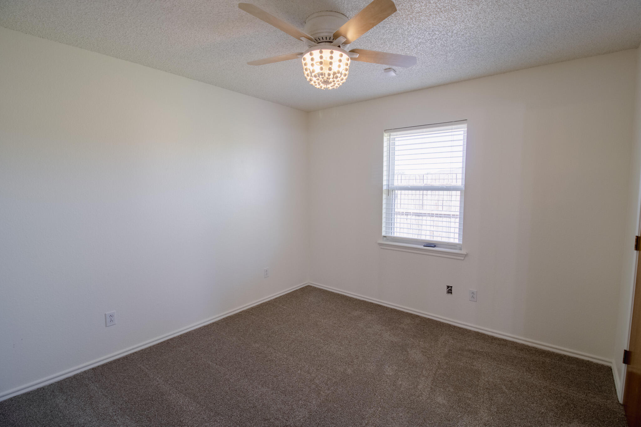 5731 95th Street Lubbock, TX 79424 - Photo 15 of 30 an empty room with a window