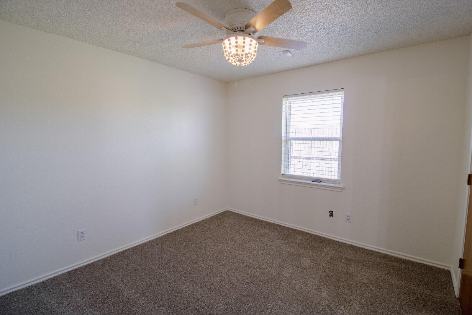 5731 95th Street Lubbock, TX 79424 - Photo 30 of 30 an empty room with a window