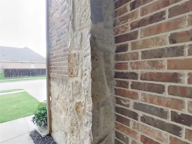 a view of a brick wall