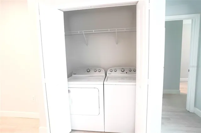 a utility room with dryer and washer