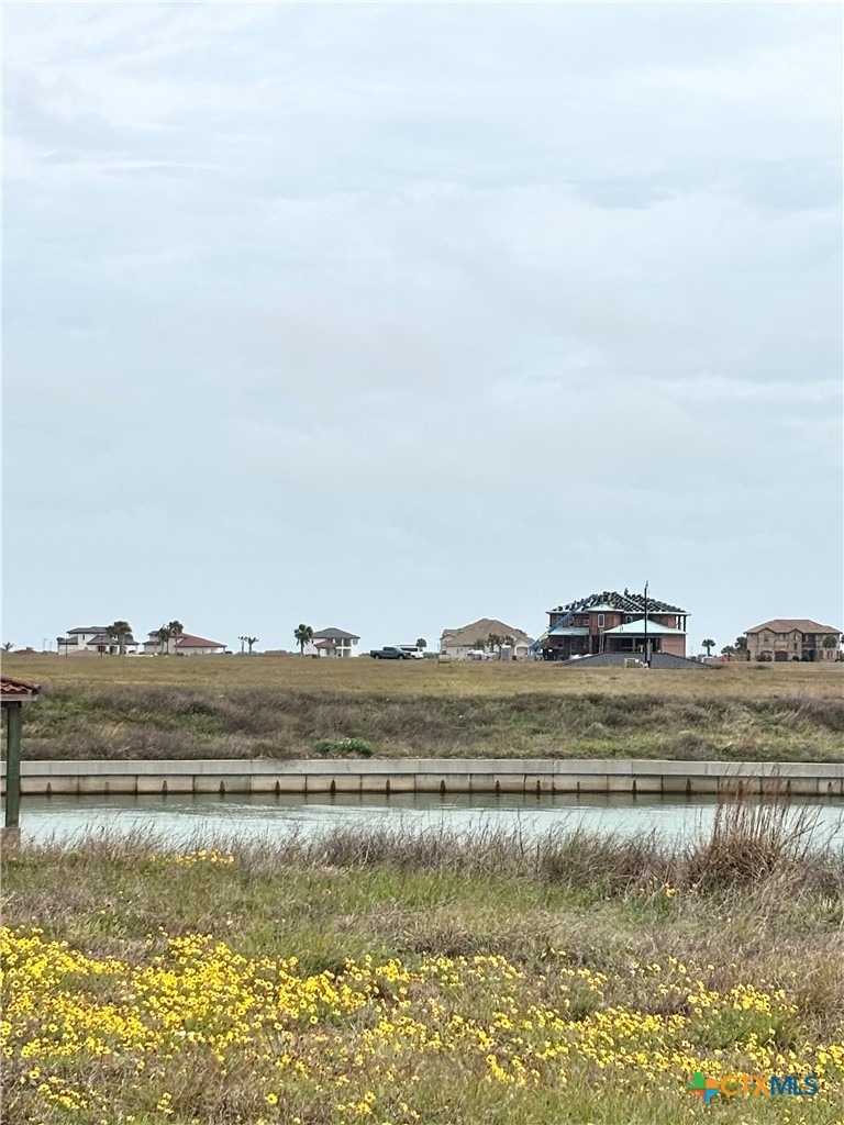 72 Blanc Court Port O'Connor, TX 77982 - Photo 2 of 8 a view of a lake and mountain