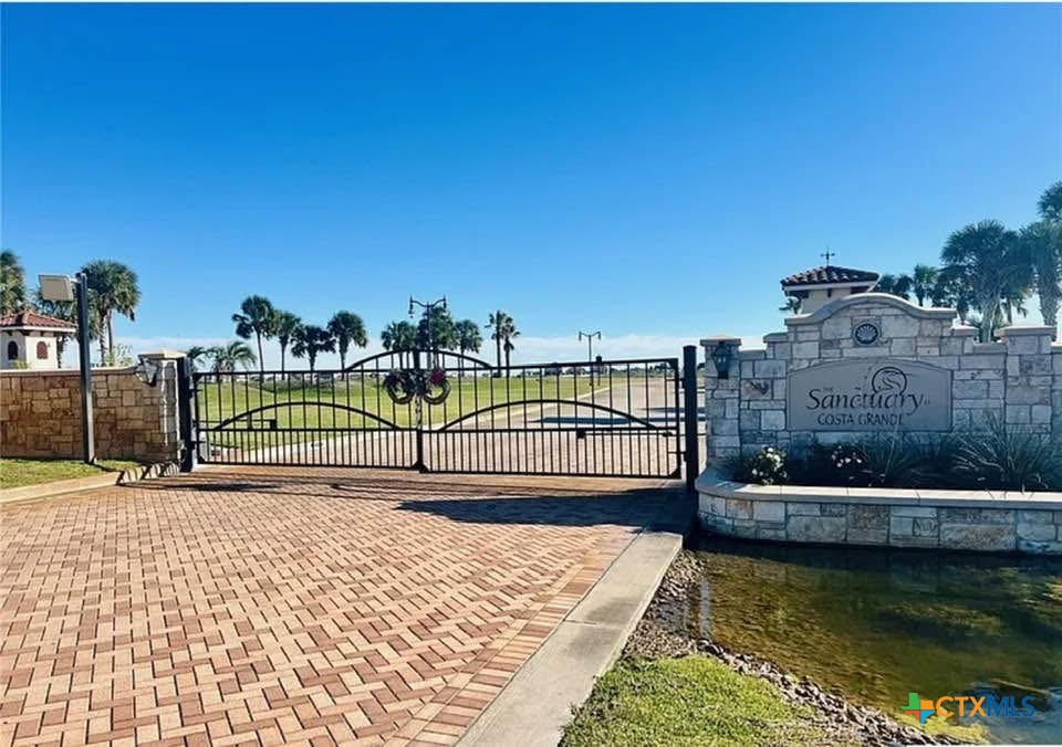72 Blanc Court Port O'Connor, TX 77982 - Photo 5 of 8 a view of a balcony with floor to ceiling window and outdoor