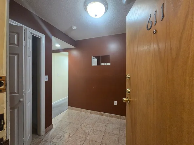 a bathroom with a toilet sink and shower