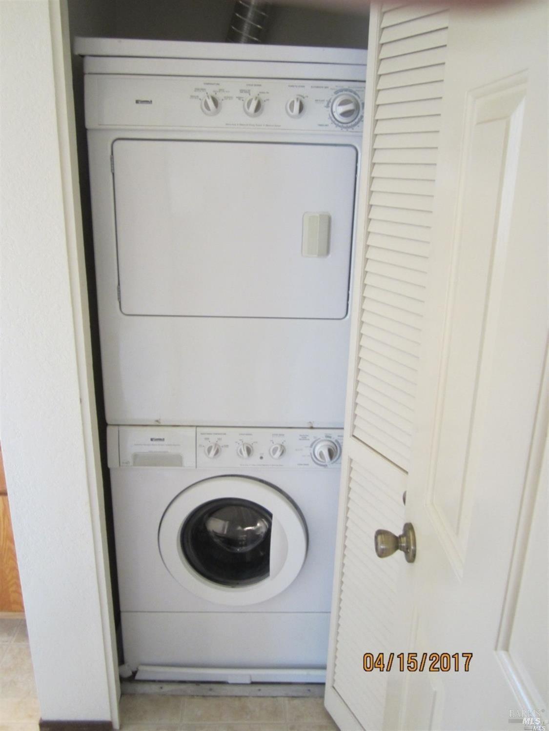 1939 Windmill Circle Santa Rosa, CA 95403 - Photo 14 of 20 a utility room with dryer and washer