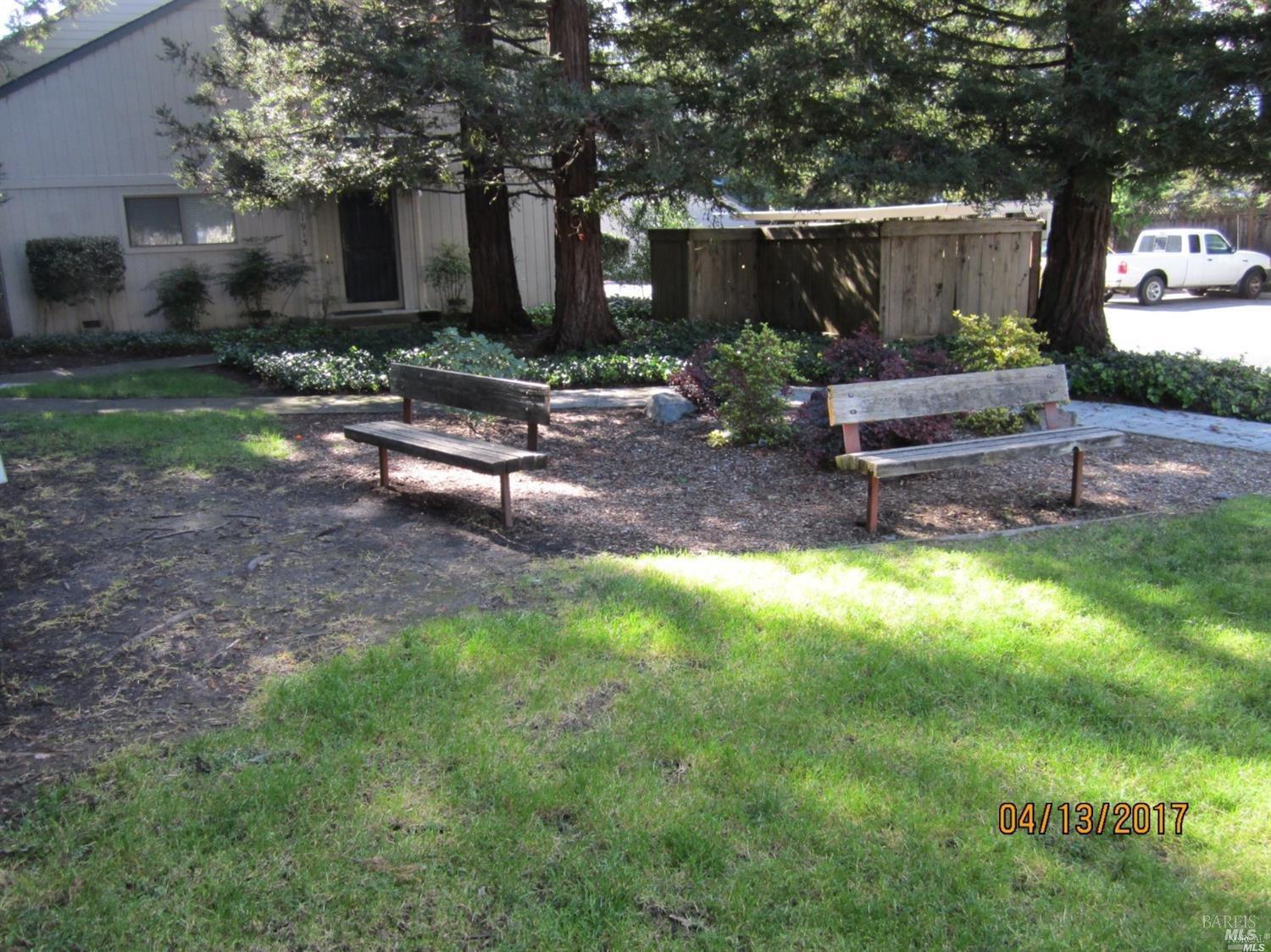 1939 Windmill Circle Santa Rosa, CA 95403 - Photo 20 of 20 a backyard of a house with outdoor seating