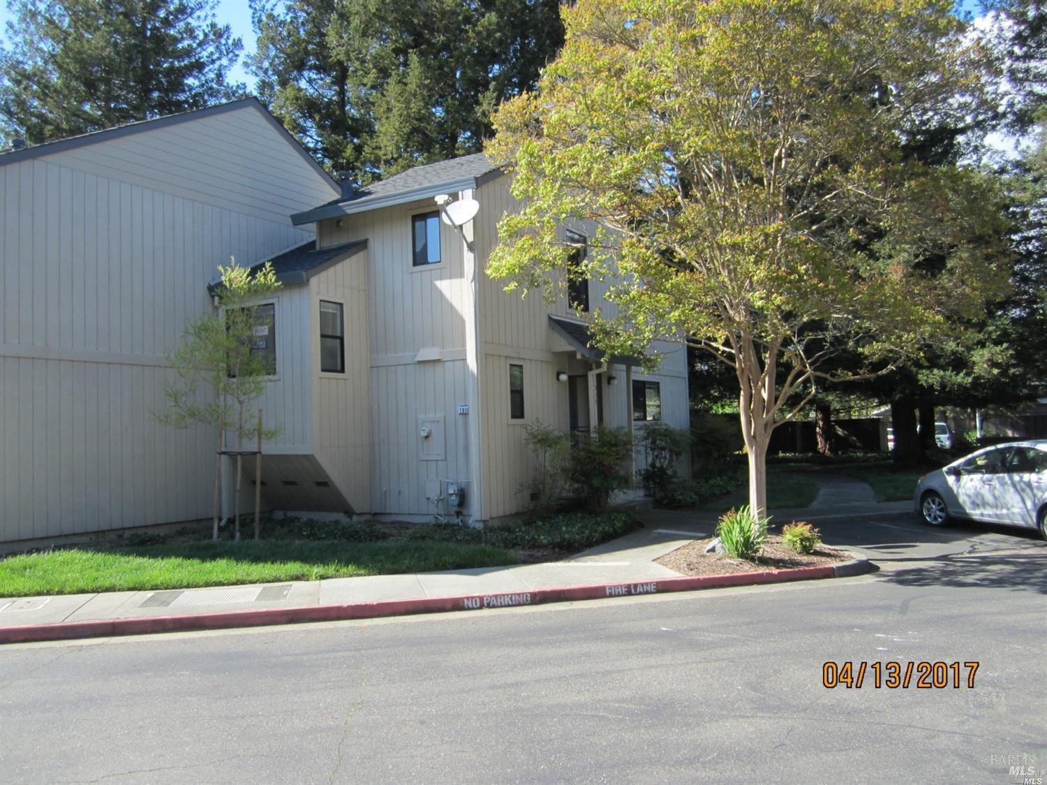 1939 Windmill Circle Santa Rosa, CA 95403 - Photo 3 of 20 a view of street along with house and trees