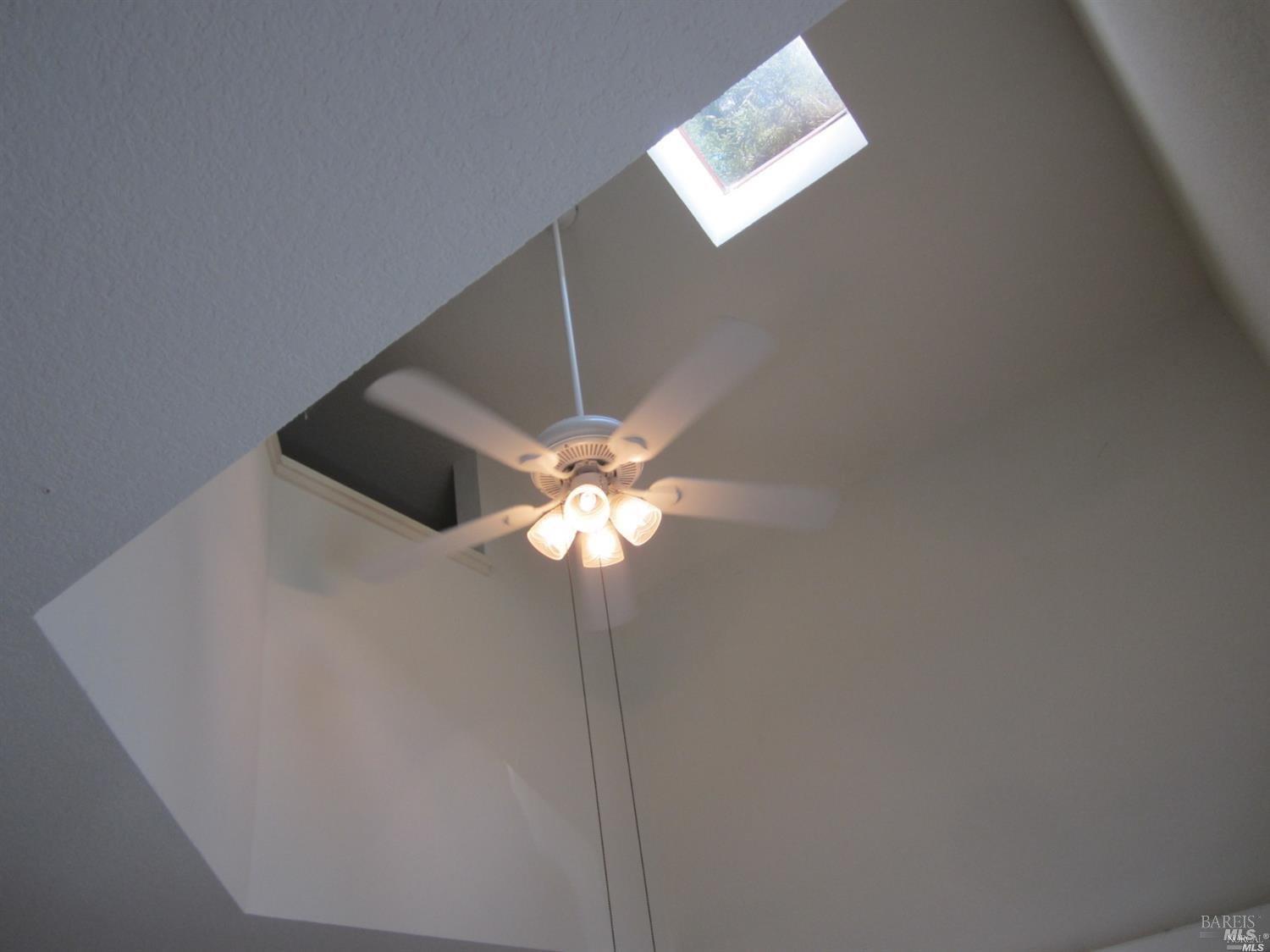 1939 Windmill Circle Santa Rosa, CA 95403 - Photo 9 of 20 a view of a ceiling fan with a window