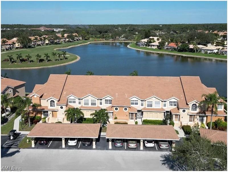 13060 Amberley Court, Unit 807 Bonita Springs, FL 34135 - Photo 18 of 33 an aerial view of residential houses with outdoor space