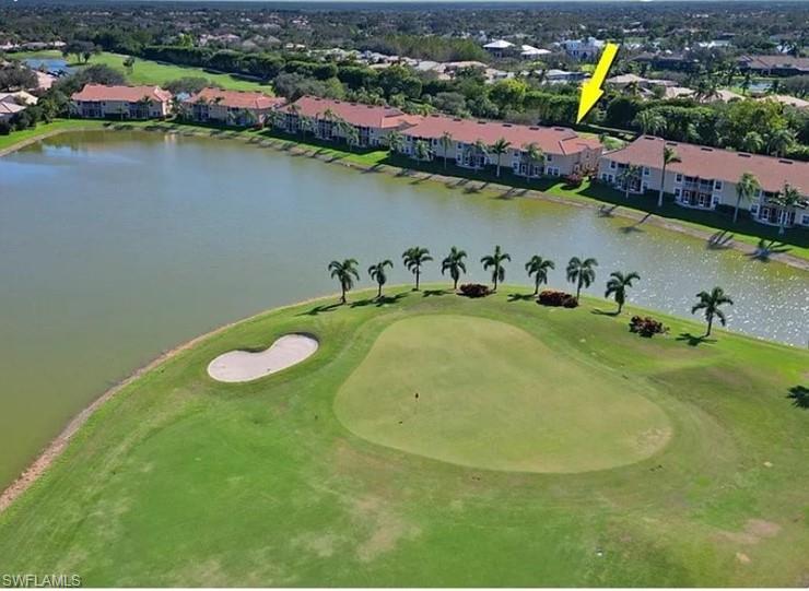 13060 Amberley Court, Unit 807 Bonita Springs, FL 34135 - Photo 21 of 33 an aerial view of a house with outdoor space lake view and boat
