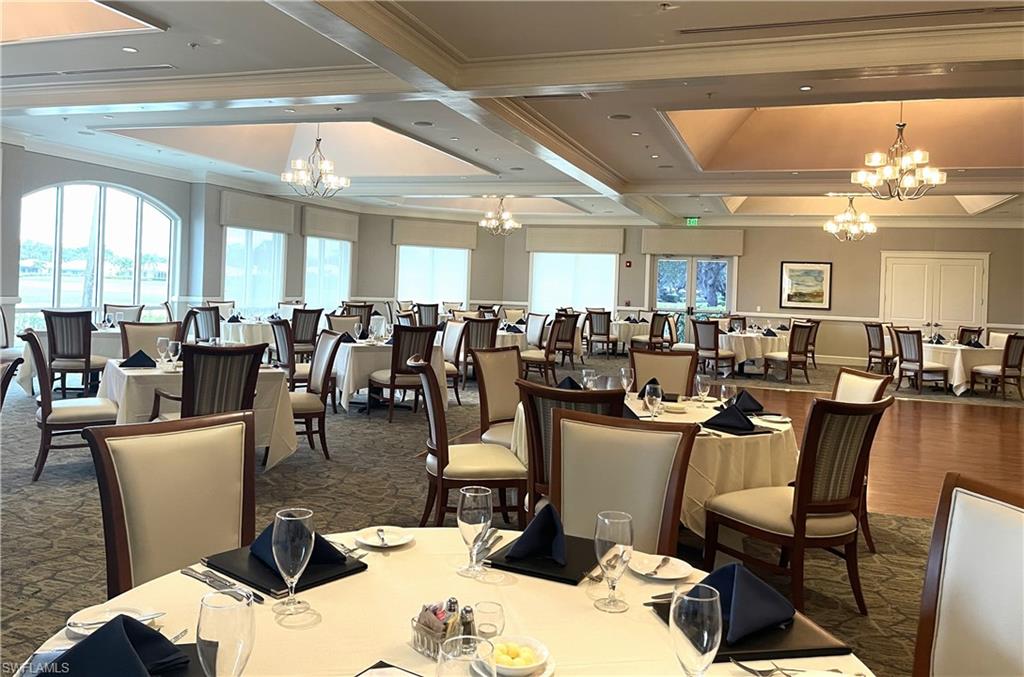 13060 Amberley Court, Unit 807 Bonita Springs, FL 34135 - Photo 26 of 33 a view of a dining room with furniture window and outside view