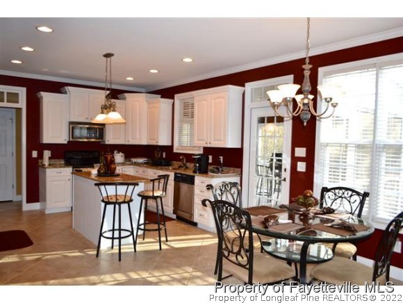 95 Falling Water Road Spring Lake, NC 28390 - Photo 8 of 20 a dining room with furniture and window