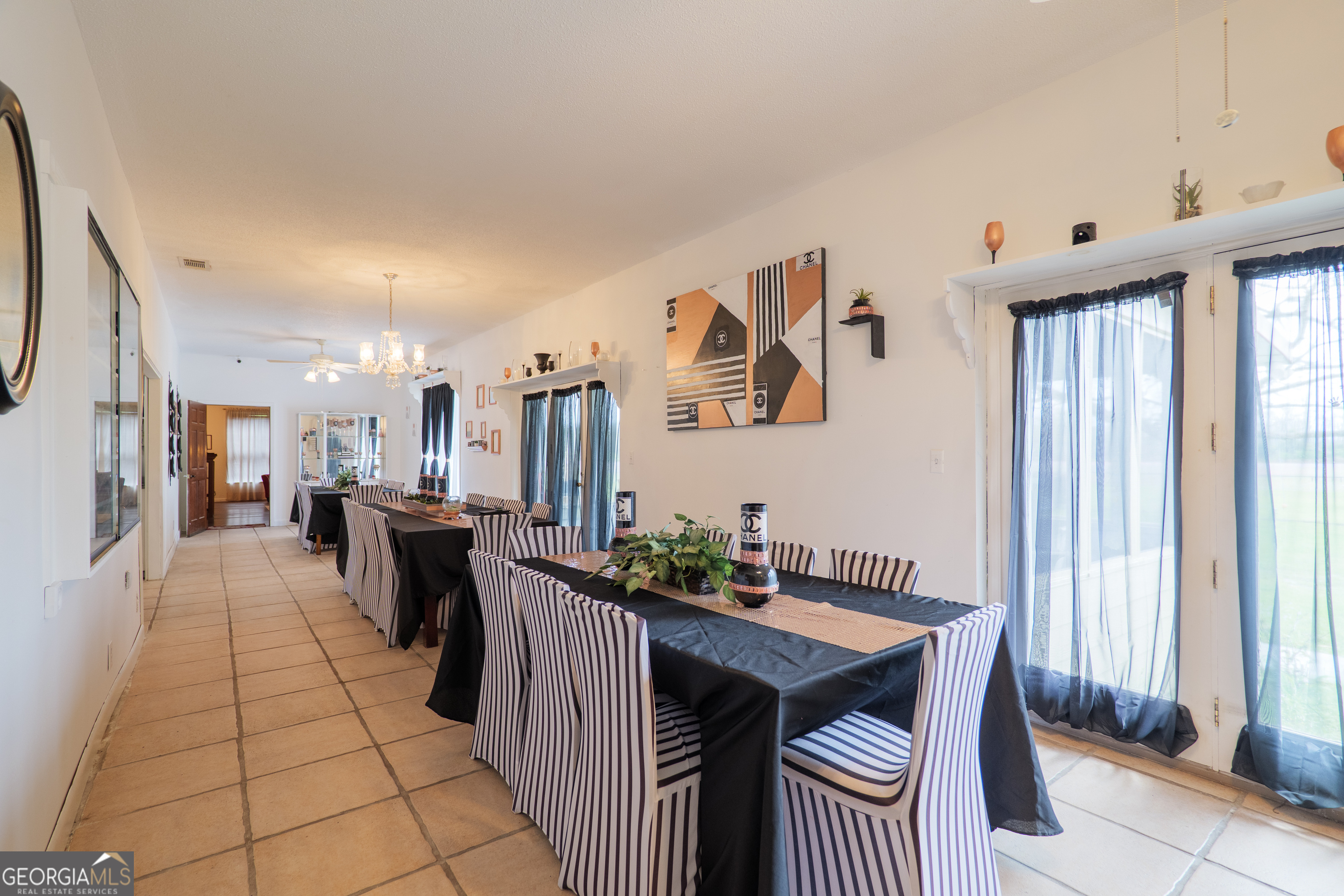 3473 Kay Circle Valdosta, GA 31606 - Photo 31 of 79 a view of a dining room with furniture window and outside view