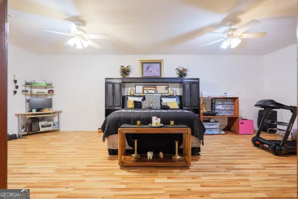 a bathroom with a sink toilet and mirror