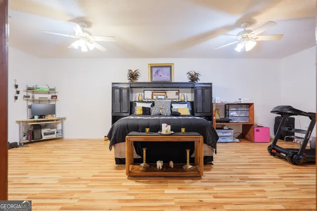 a bathroom with a sink toilet and mirror