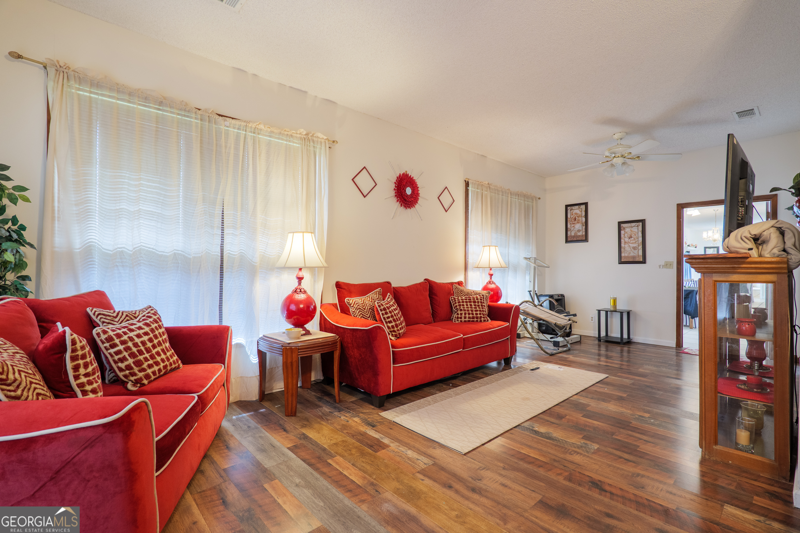 3473 Kay Circle Valdosta, GA 31606 - Photo 48 of 79 a living room with furniture and a wooden floor
