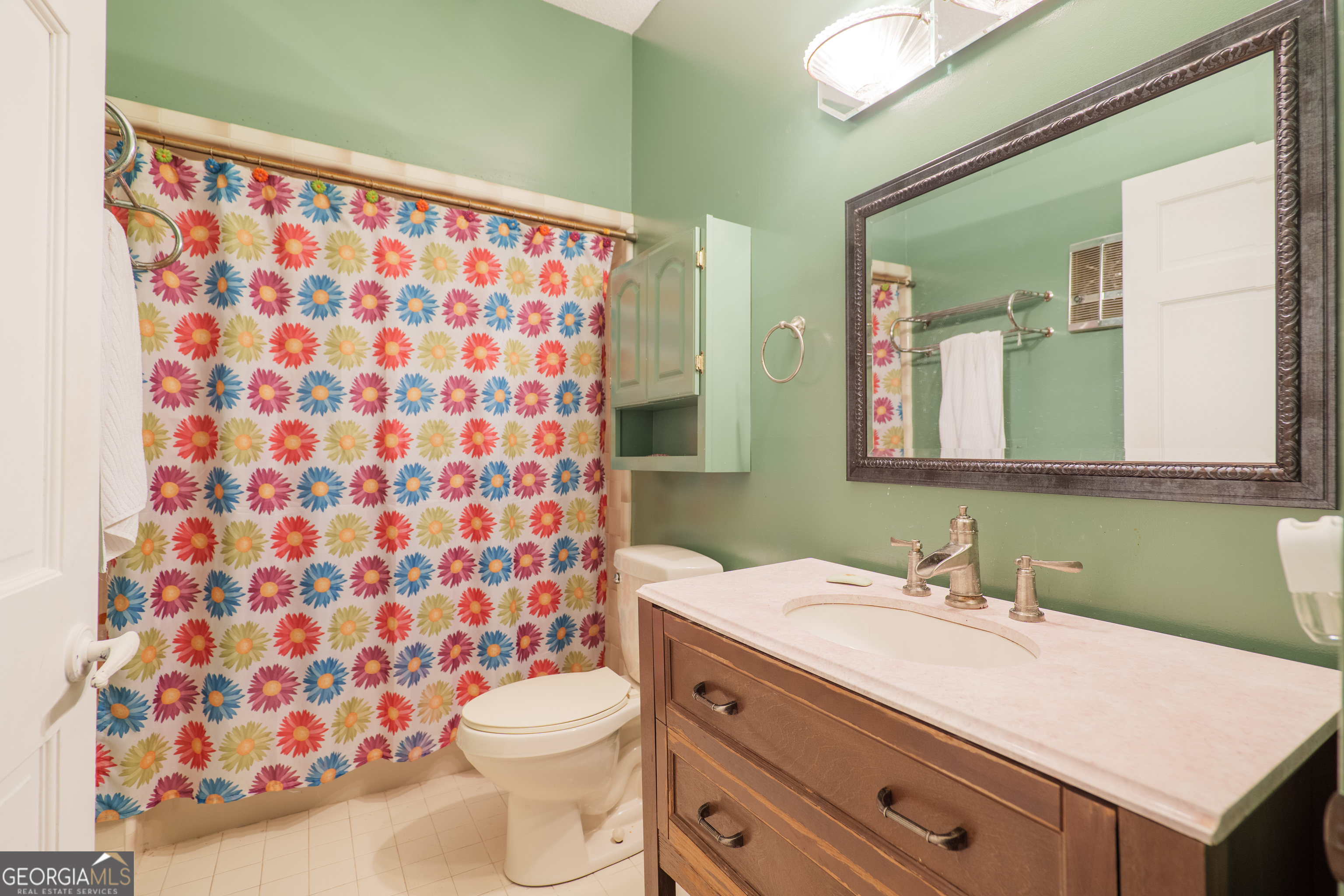 3473 Kay Circle Valdosta, GA 31606 - Photo 53 of 79 a bathroom with a sink toilet and shower