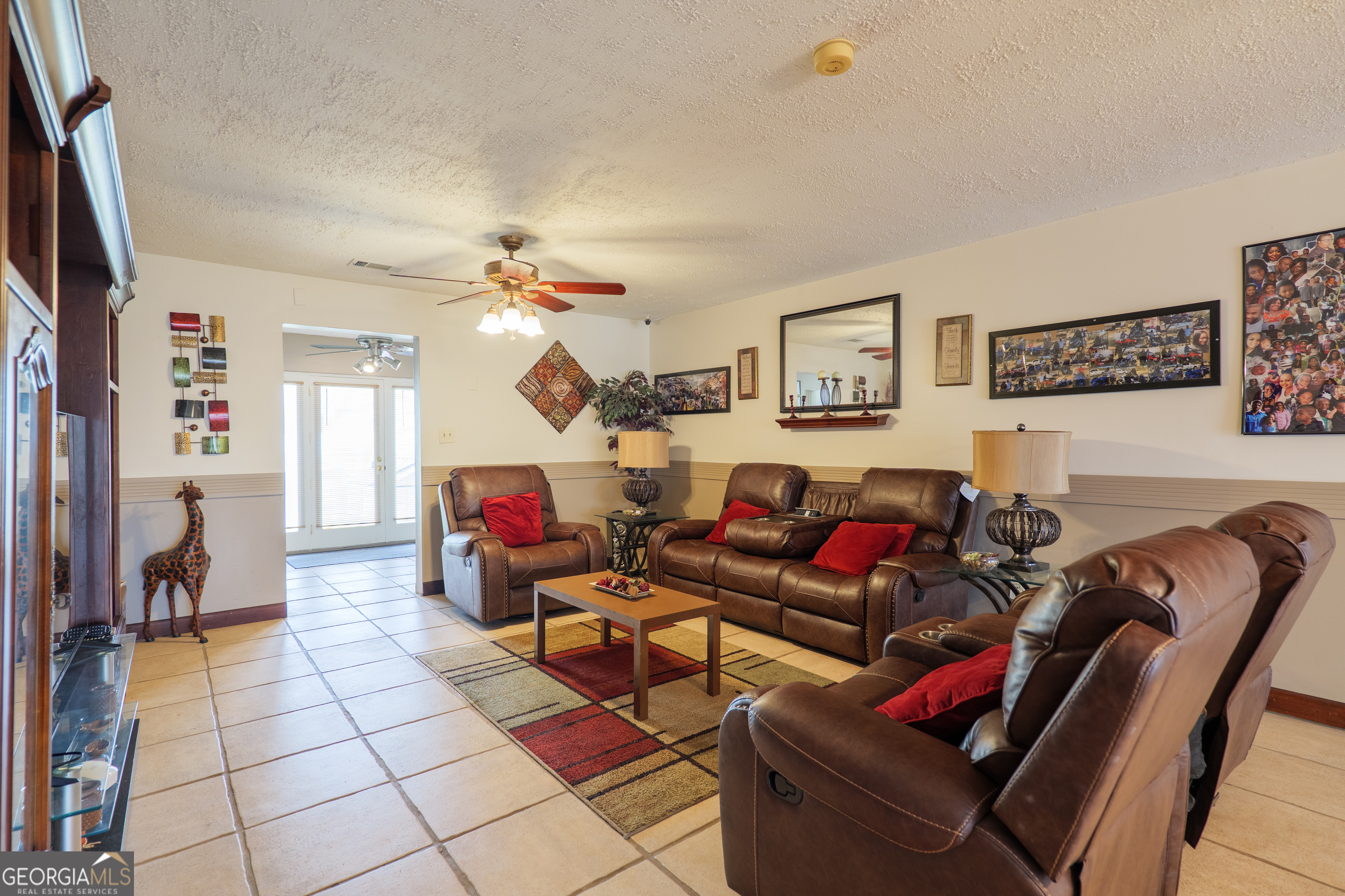 3473 Kay Circle Valdosta, GA 31606 - Photo 60 of 79 a living room with furniture and a flat screen tv
